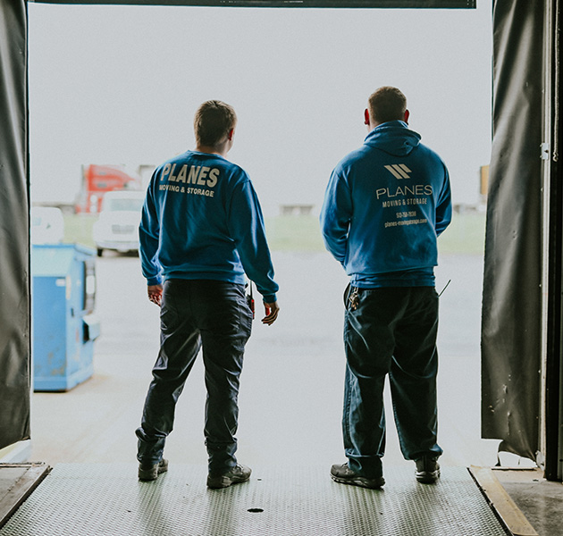 Planes employees on moving truck