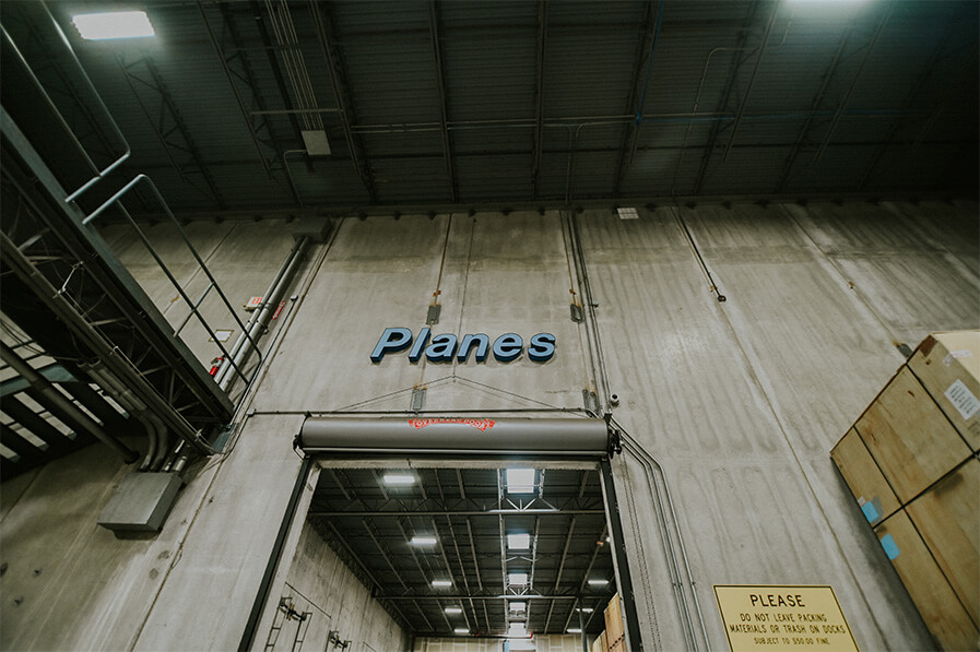 Planes warehouse entrance sign