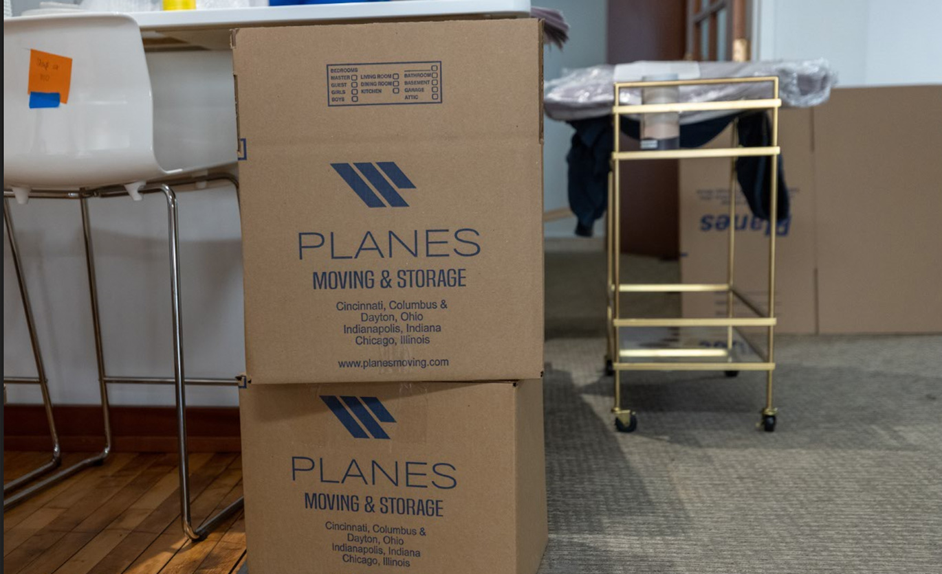 Planes boxes during white glove installation.